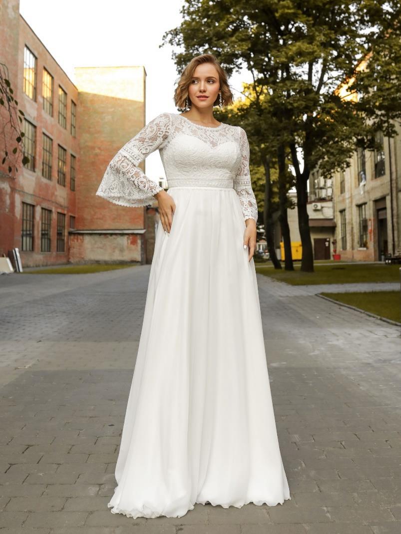 Νυφικό φόρεμα με μπούστο και μανίκι όλο δαντέλα